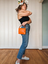 Load image into Gallery viewer, Mini Clutch in Italian Orange Vegetable Tanned Leather
