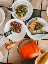 Load image into Gallery viewer, Mini Clutch in Italian Orange Vegetable Tanned Leather
