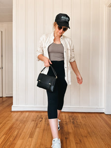 Medium Clutch in Black Vegetable Tanned Leather with Shortie Handle