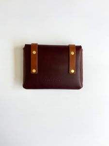 Mini Clutch in Burgundy Vegetable Tanned Leather with Cognac Straps
