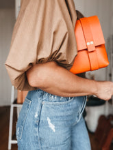 Load image into Gallery viewer, Medium Clutch in Iconic Orange Vegetable Tanned Leather
