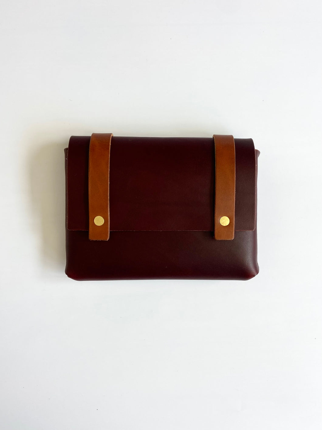 Mini Clutch in Burgundy Vegetable Tanned Leather with Cognac Straps