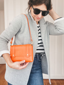 Iconic Orange Leather Mini Clutch with Sling Strap and Extender