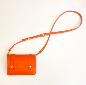 Iconic Orange Leather Mini Clutch with Crossbody