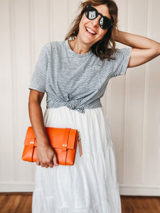 Medium Clutch in Iconic Orange Vegetable Tanned Leather