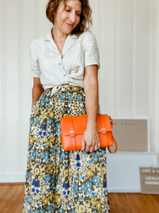 Medium Clutch in Iconic Orange Vegetable Tanned Leather